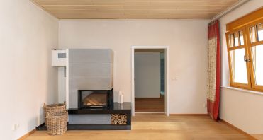 10 Kaminofen im Wohnzimmer - Immobilienmakler-Potsdam.jpg